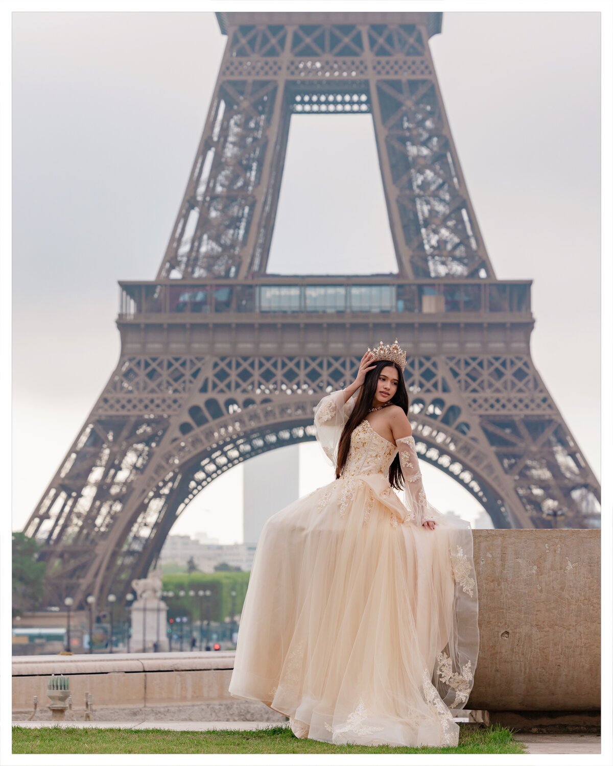 A quinceañera ball gown on an ornate Paris bridge — Glam In Paris